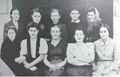 М.Е. Ионкина (в верхнем ряду справа) начинала свою трудовую деятельность в школе поселка Коксового. На фото она с коллегами-учителями, 1940-е годы.